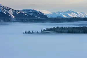 Yukon: Mist hangs over a frozen lake