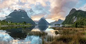 Milford: Mitre Peak, reflection in water, sunset, Milford