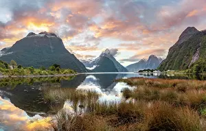 Milford: Mitre Peak, reflection in water, sunset, Milford