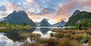 Milford: Mitre Peak, reflection in water, sunset, Milford