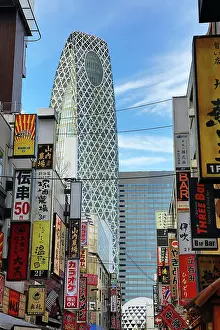 Tower: Mode Gakuen Coccoon Tower and building signs in Shinjuku, To