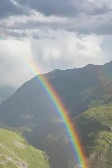 Filled: Moelltal Valley filled with clouds and rainbow -