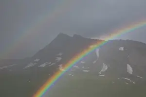 Filled: Moelltal Valley filled with clouds and rainbow -