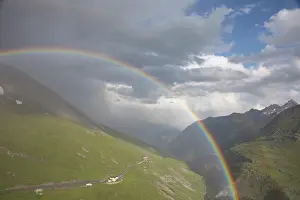 Filled: Moelltal Valley filled with clouds and rainbow -