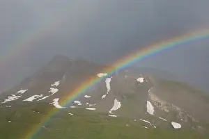 Filled: Moelltal Valley filled with clouds and rainbow -