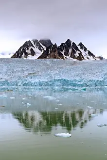 Circle: Monacobreen, glacier in Haakon VII Land which debouches into