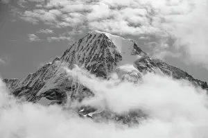 Grindelwald: Monch (4, 107 m) rising above clouds, Bernese