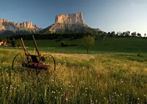 Vercors: Mont Aiguille at dawn, with hay meadow. Limestone