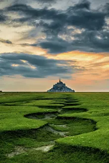 Monuments: Mont Saint-Michel and its meanders at sunset, Manche