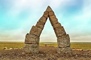 Megalithic: Monumental stone gate in barren landscape, Arctic