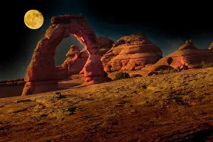 Moon: Full moon over Delicate Arch. Arches National Park