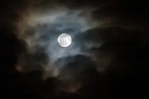 Moonlight: Full moon and passing clouds at night