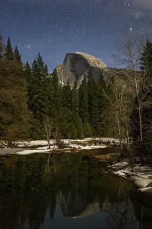 Moonlight: A moonlit Half Dome reflects in the Merced Rive