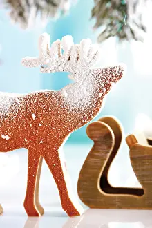 Made: Moose, reindeer, made of wood, covered with snow
