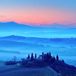 Hour: Morning atmosphere in Tuscany, hilly landscape with
