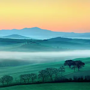 Hour: Morning atmosphere in Tuscany, hilly landscape with