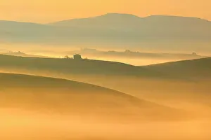Hour: Morning atmosphere in Tuscany, hilly landscape with