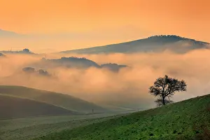 Hour: Morning atmosphere in Tuscany, hilly landscape with