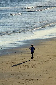 Exercising: Morning Jogger - on North Sea beach