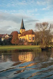 Main: Morning light on church along Main River