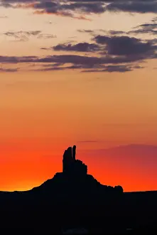 Table: Morning sky with silhouette at Monument Valley
