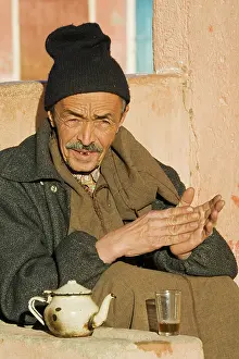 Berbers: Morocco - A Berber in Tafraoute enjoys a mint tea