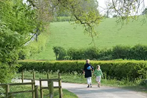 Daughter: Mother and daughter - walking down country road
