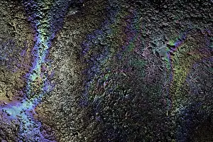 Motor: Motor oil creating rainbow pattern on pavement