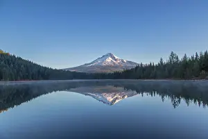 Hood: Mount Hood reflects into calm waters of