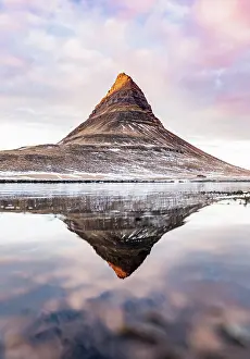 Grundafjrdur: Mount Kirkjufell reflected in the water, cloudy