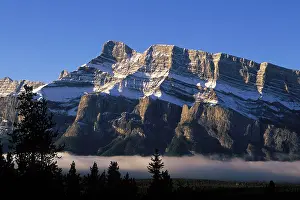 Rundle: Mount Rundle above foggy Banff valley