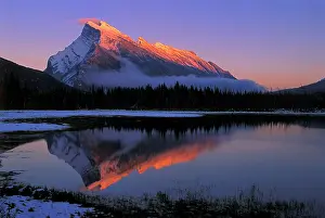 Vermillion: Mount Rundle reflecting in Vermillion Lakes at sunset