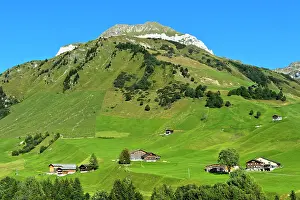 Cabin: Mountain landscape with scattered settlement in