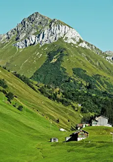 Cabin: Mountain landscape with scattered settlement in