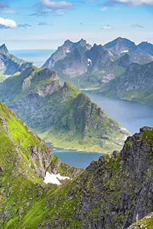 Lofoten: Mountain landscape with steep rocky peaks fjords