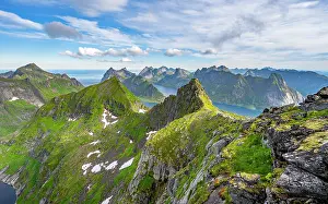 Lofoten: Mountain landscape with steep rocky peaks fjords