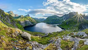 Lofoten: Mountain landscape with steep rocky peaks and lake