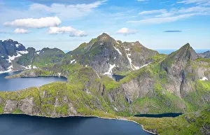 Lofoten: Mountain landscape with steep rocky peaks, lakes