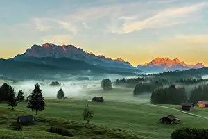 Huts: Mountain meadows with small huts in light ground