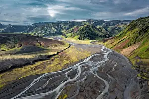 Current: Mountain panorama, volcanic landscape and river