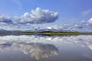 Swedish: Mountain peak Storsnasen in the Snasahogarna mountain range reflected in Lake Annsjon