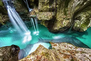 Flows: Mountain river Soca flows through narrow canyon