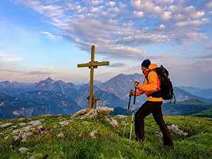Mountaineer: Mountaineer at the summit cross of the Hochs&, x4d6c;