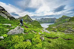 Lofoten: Mountaineers climbing Hermannsdalstinden, view of