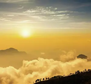 Waterway: Mountains in clouds on sunrise. Kodaikanal, Tamil Nadu