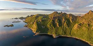 Estuary: Mountains by the fjord in the evening, coast near