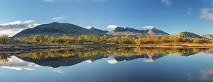 Oppland: Mountains Hogronden and Digerronden mirrored in a lake at Do