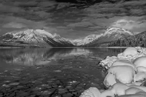 Haney: Mountains reflect in wintry Lake McDonald in Glacier