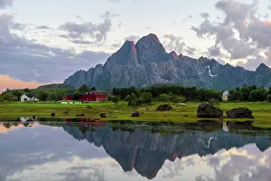 200421: Mountains reflected in a fjord, sunset, Lofoten