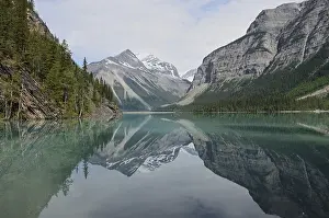 Alberta: Mountains reflected in Kinney Lake